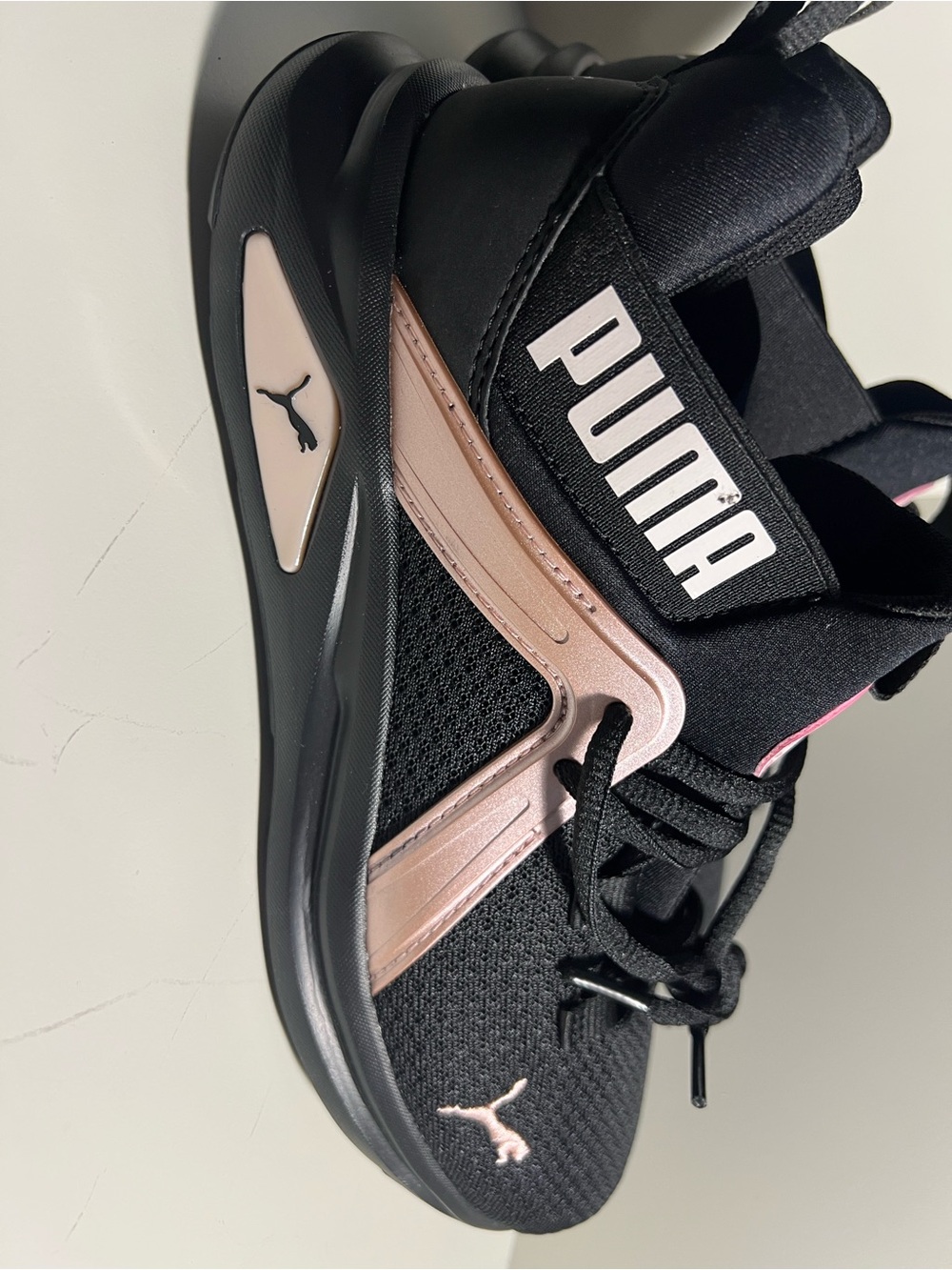 Puma Women's Black with Rose Gold Accent Athletic Sneakers